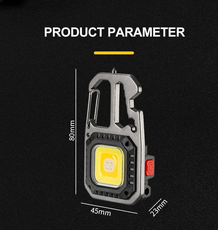 COB keychain work light, black metal body with yellow LED module and red power button with carabiner clip