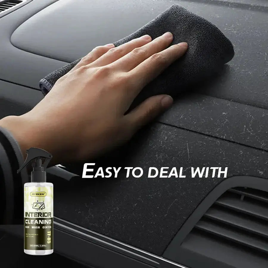 Ryekew interior cleaner spray bottle with a hand wiping a car dashboard using a black cloth