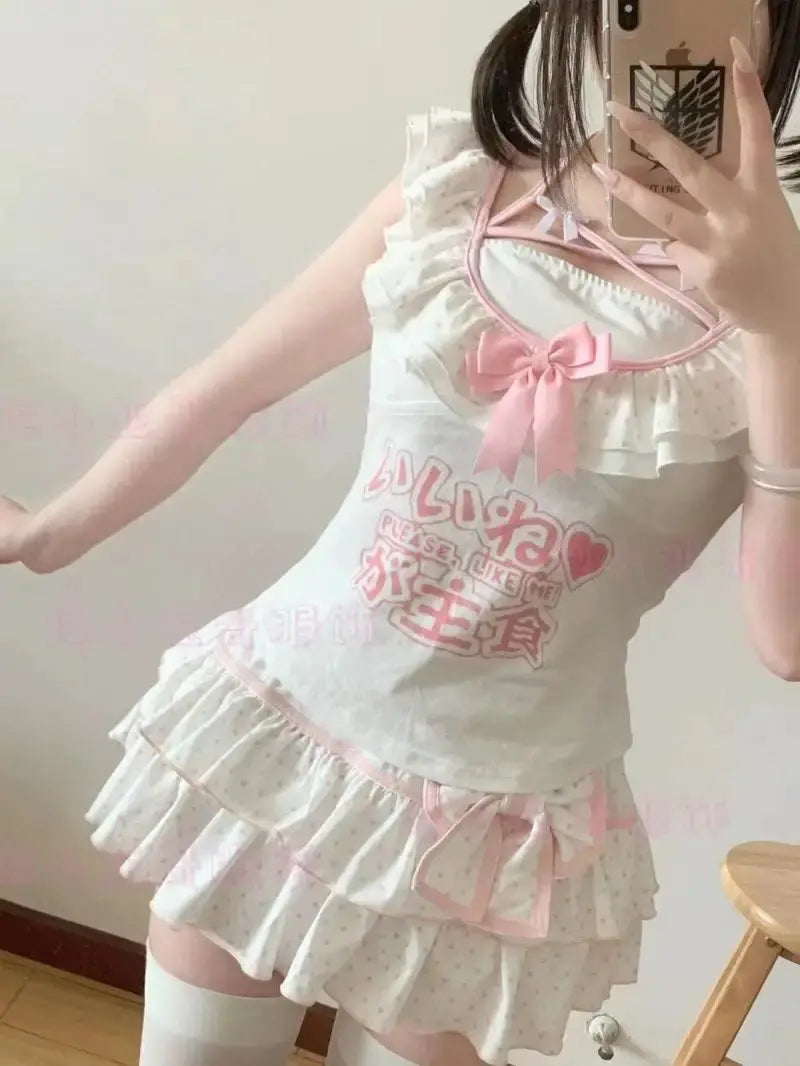 Harajuku Lolita mini skirt by Simples Market; white with pink bow, polka-dot pattern, layered ruffles
