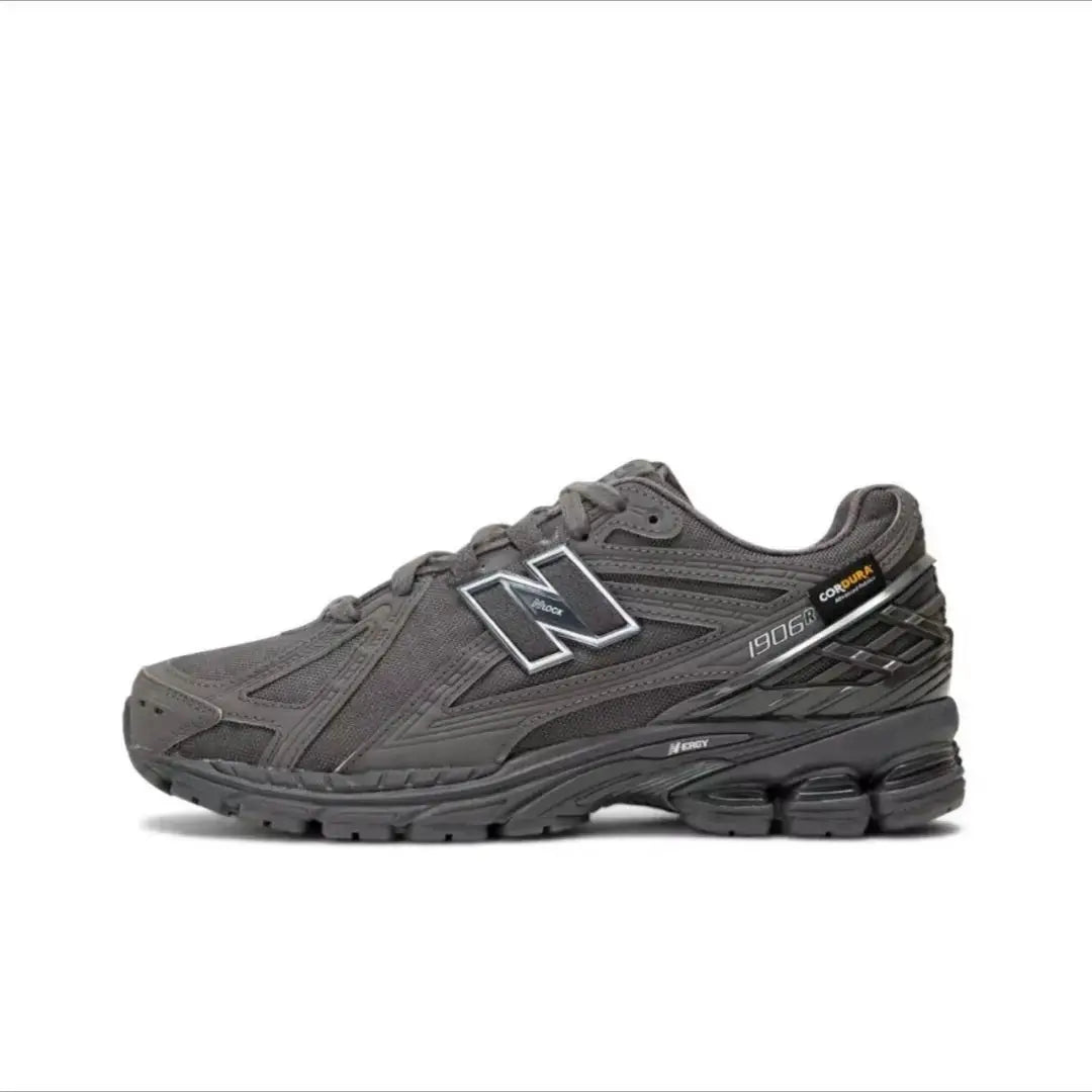 New Balance 1906R retro running shoes, gray/black, breathable mesh upper.