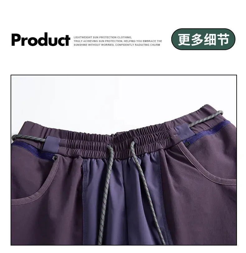 Cargo track pants by Simples Market in purple with elastic waistband and drawstring, lightweight quick-dry fabric.