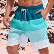 Sea Beach striped swim shorts for men by Simples Market with teal-blue bands, white drawstring, quick-dry.