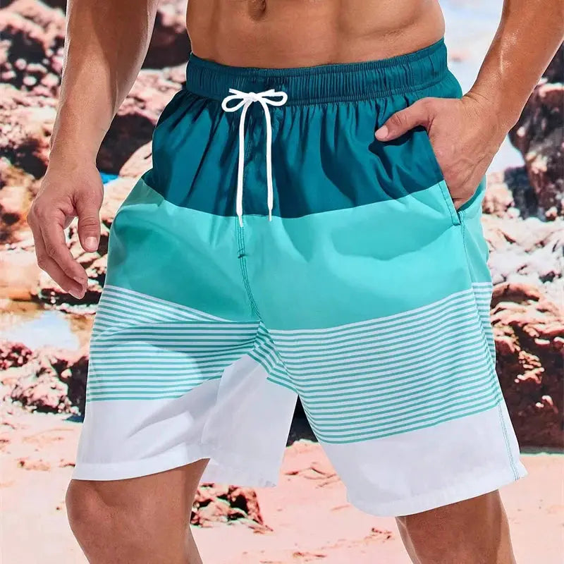 Sea Beach striped swim shorts for men by Simples Market with teal-blue bands, white drawstring, quick-dry.