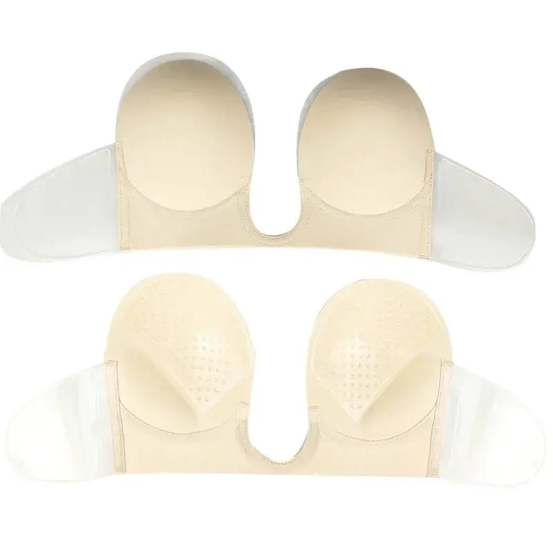 Invisible strapless silicone push-up bra, nude color with self-adhesive cups and clear side wings.