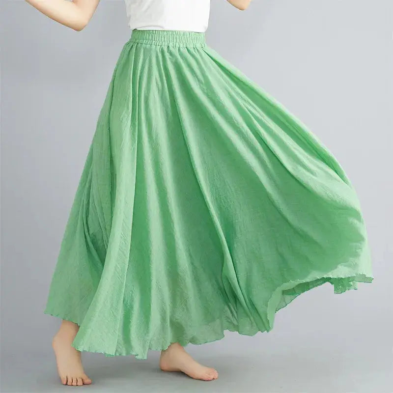Long cotton-linen Mori-style green skirt with elastic waist by Simples Market, flowing A-line maxi
