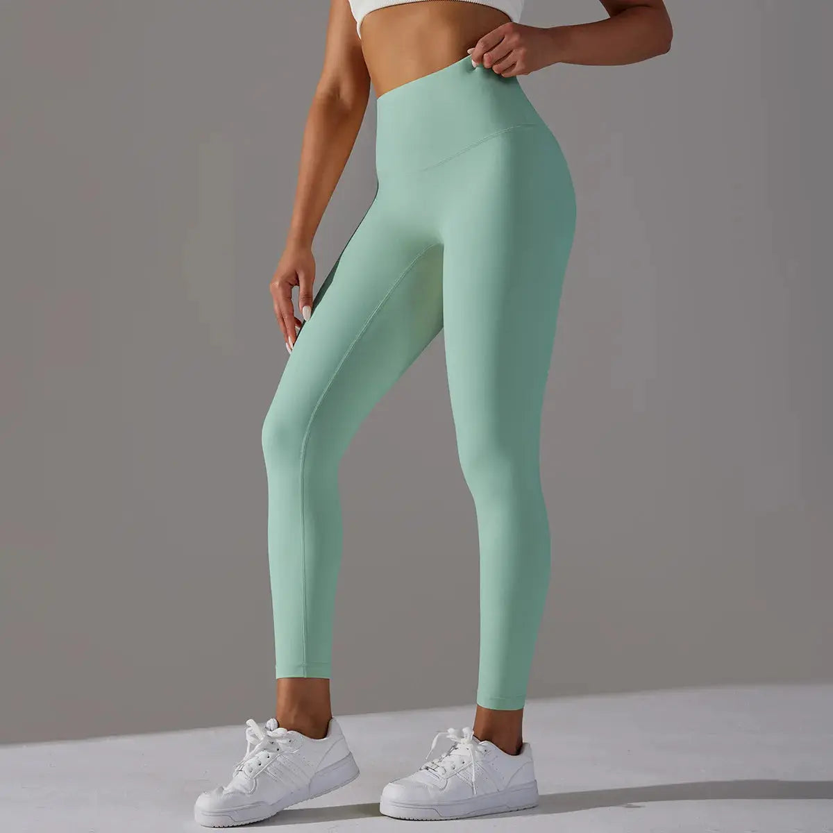 High waist naked-feeling leggings for women in mint green, perfect for fitness, running, and yoga.