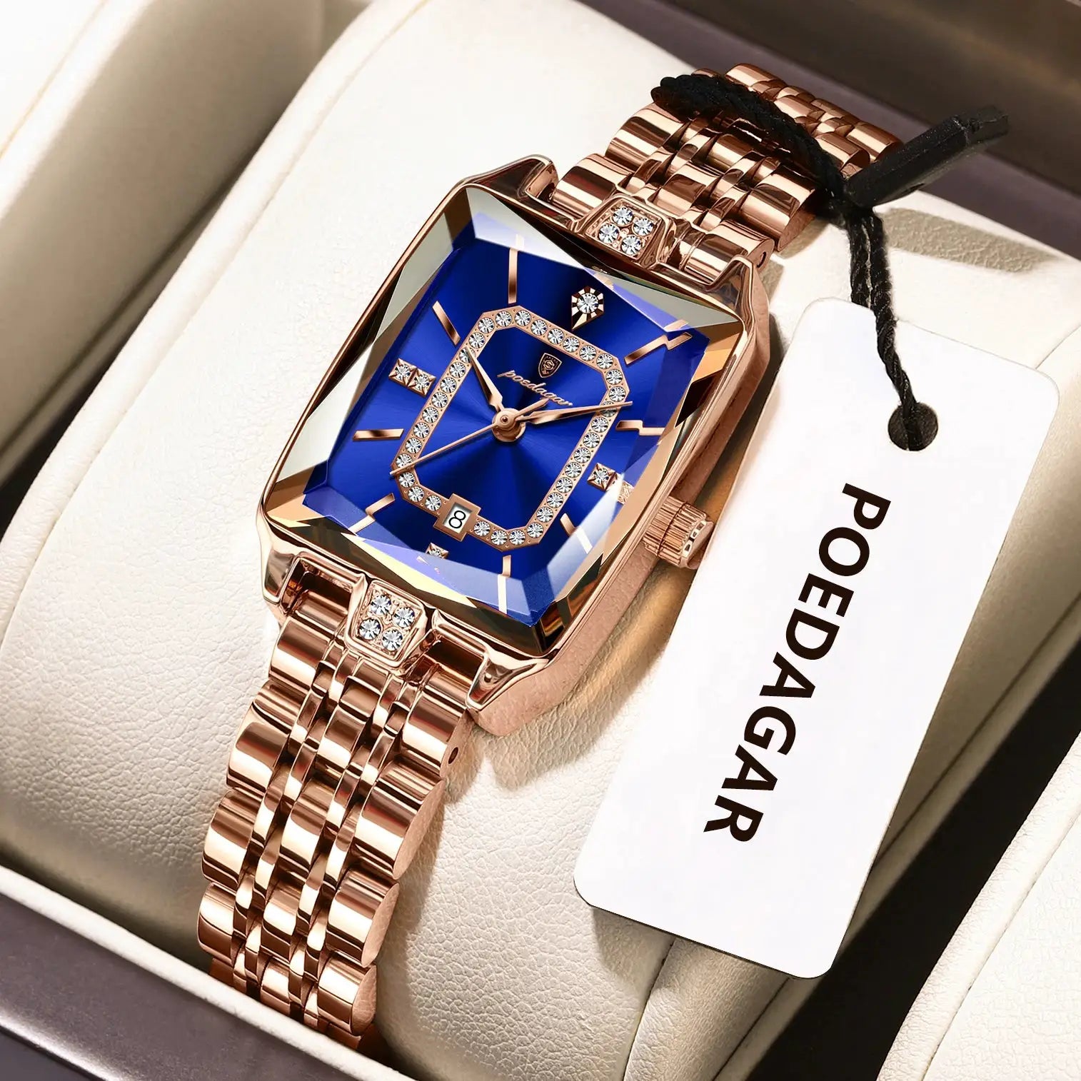 POEDAGAR watch for women with blue dial, diamond-studded bezel, and rose-gold stainless steel bracelet.