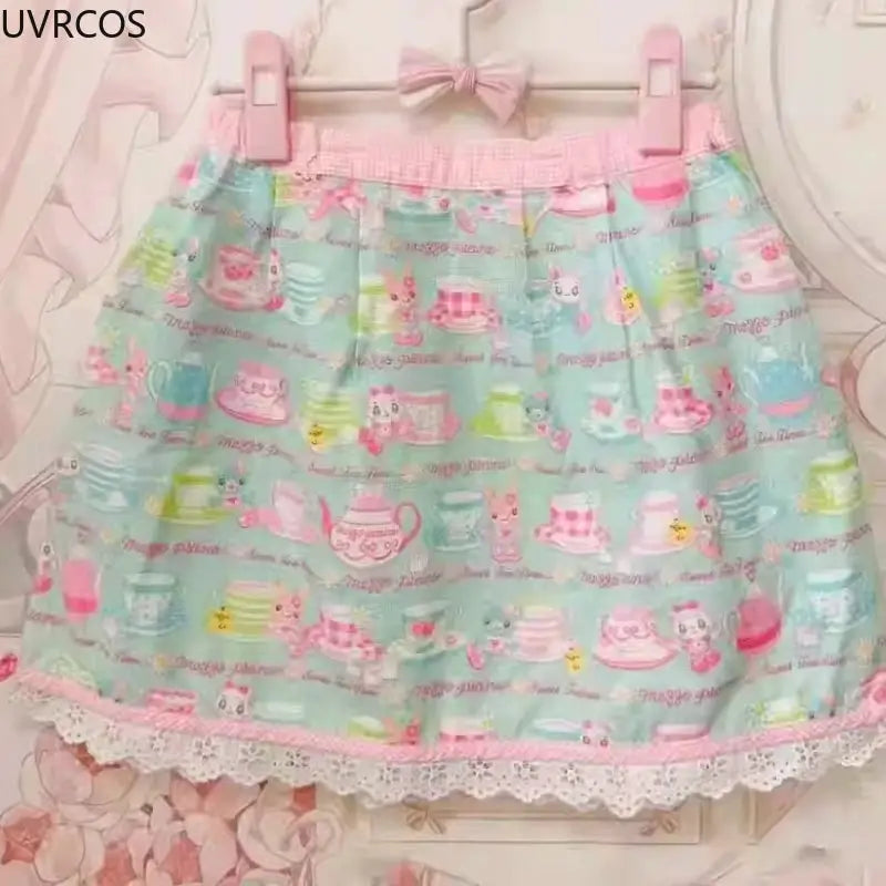 Sweet Lolita cake-print mini skirt in pastel blue with pink waistband and lace trim, by Simples Market
