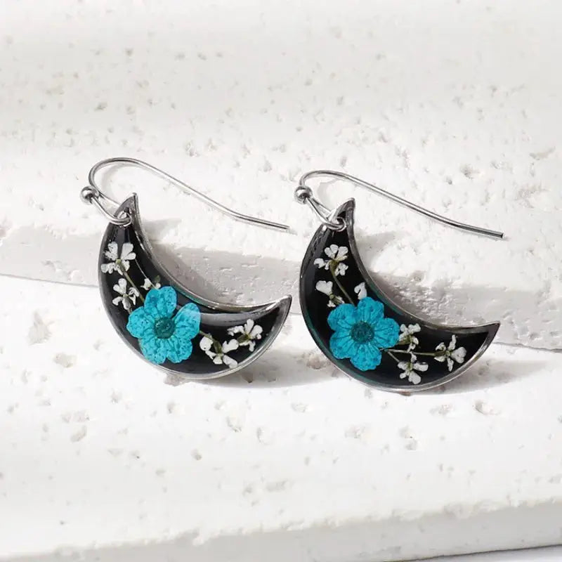 Crescent epoxy resin earrings with turquoise flower and white blossoms, silver hooks (pair)