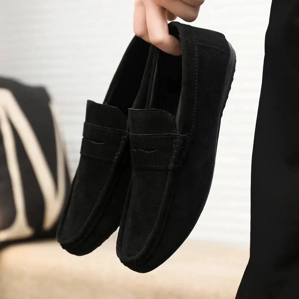 Driving loafers by Simples Market; black suede casual men's work shoes, two shown.