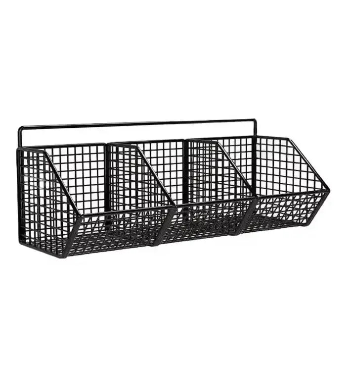 Simples Market wall-mounted black metal wire storage basket with three compartments for spices, garlic, onions.