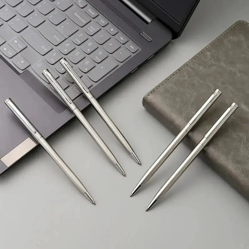 20-pack silver stainless steel ballpoint pens by Simples Market, twist-top, medium nib, six visible