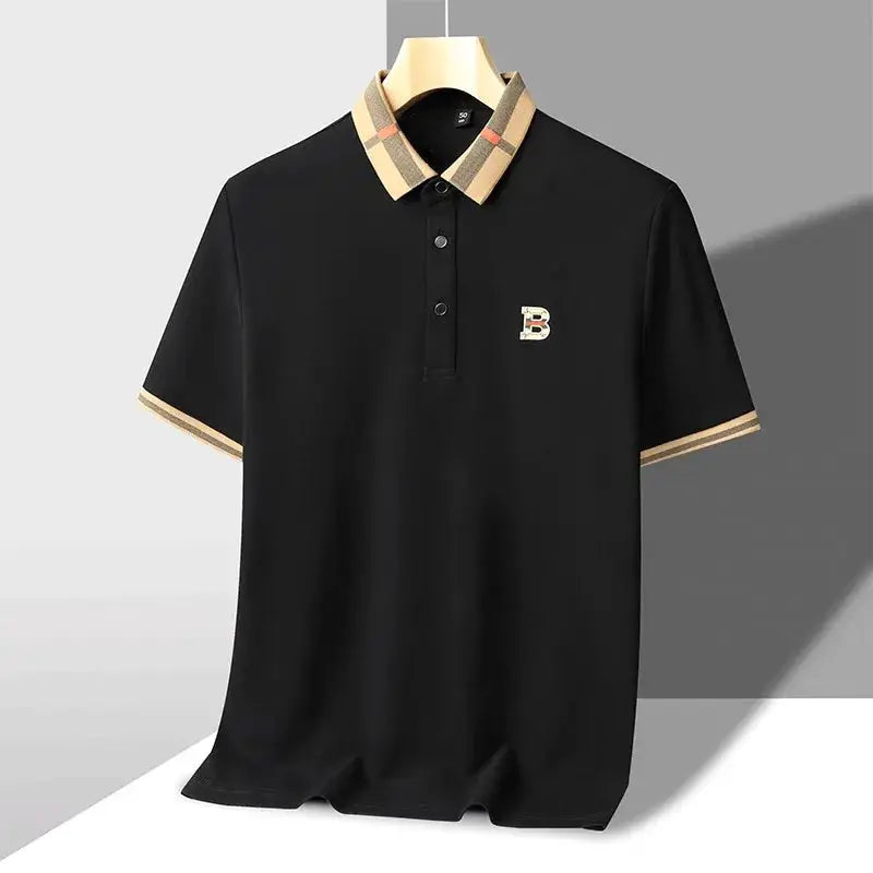 Black short-sleeve polo shirt with beige plaid collar and sleeve trim, small B logo on chest.
