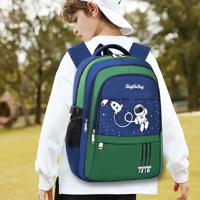 Astronaut-themed boys' school backpack, blue and green, waterproof
