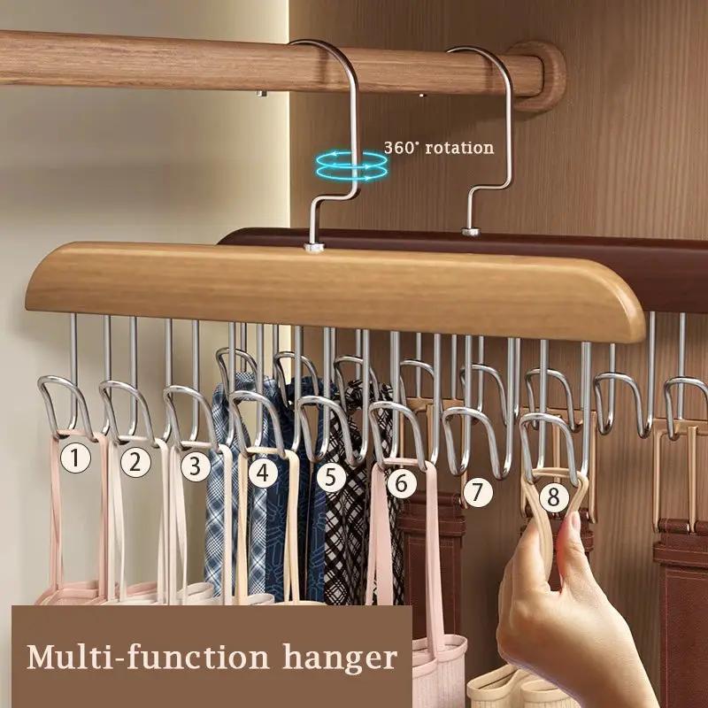 Multi-functional wardrobe bra and belt hanger with eight metal clips on a wooden rod, 360° rotation
