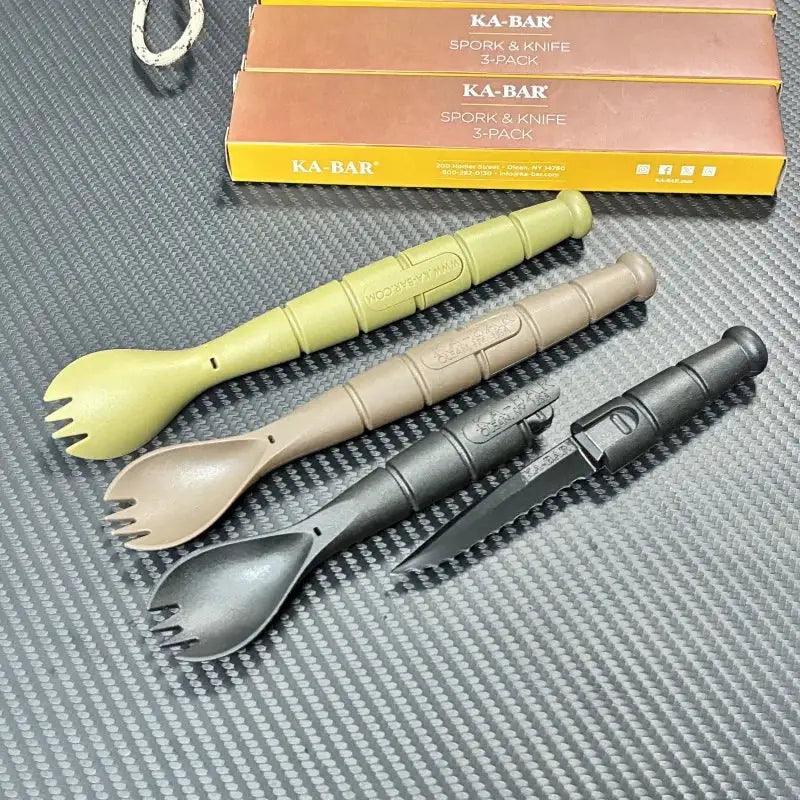 Simples Market Tactical Mini Cutlery Set, 3-pack spork and knife in green, tan, and black with KA-BAR boxes.