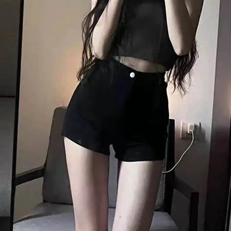 Women's black high-waisted casual shorts with a slim fit