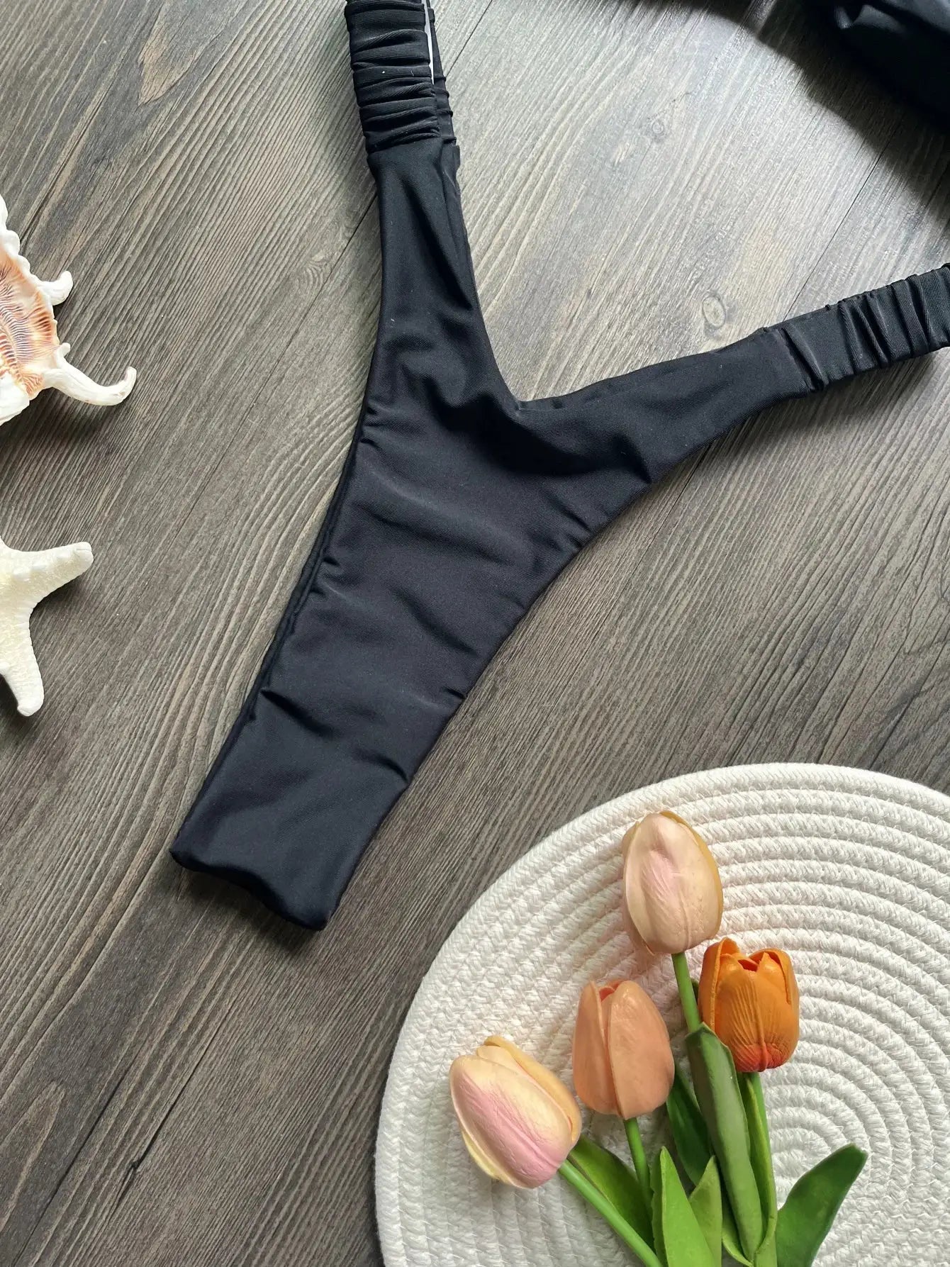 Simples Market black micro bikini bottom with ruched sides.