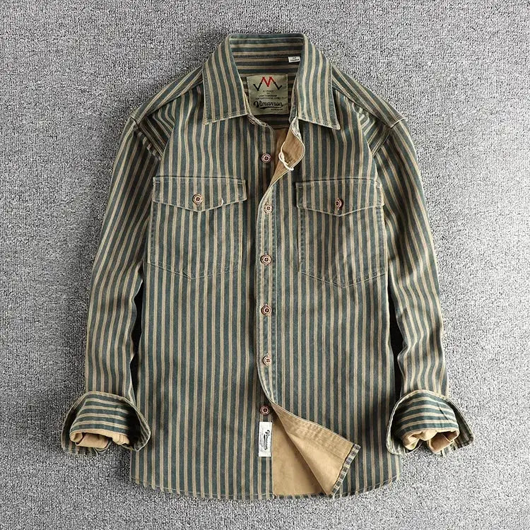 Striped long-sleeve lapel shirt by Simples Market with two chest pockets in green and beige, rolled cuffs.