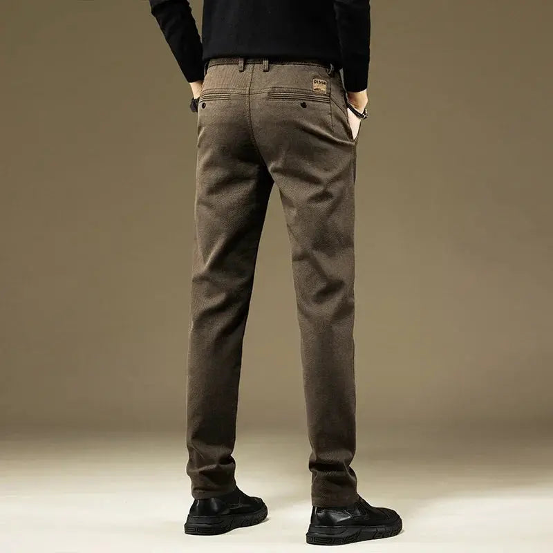 Simples Market KUBRO men's brown cotton straight-leg pants, back view with belt loops and logo patch.