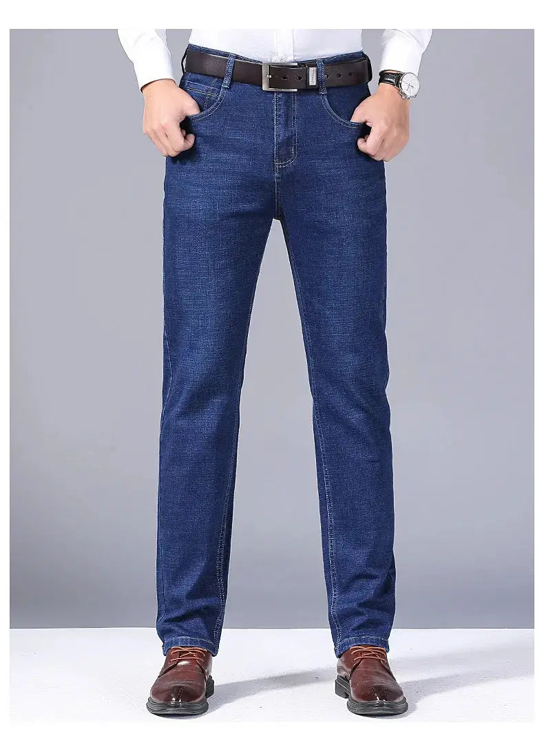 Men's blue denim straight-leg jeans, full-length with visible stitching