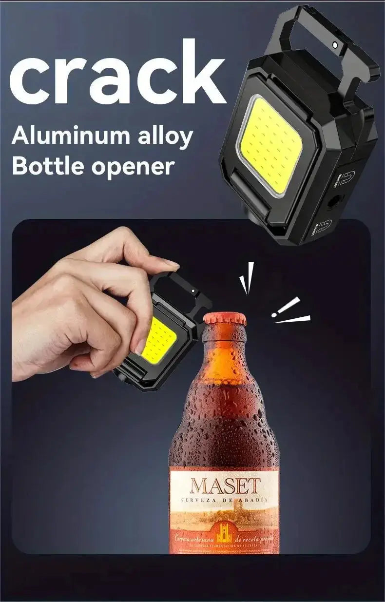 Simples Market compact black keychain flashlight with COB LED, USB rechargeable and 90-degree foldable side lights