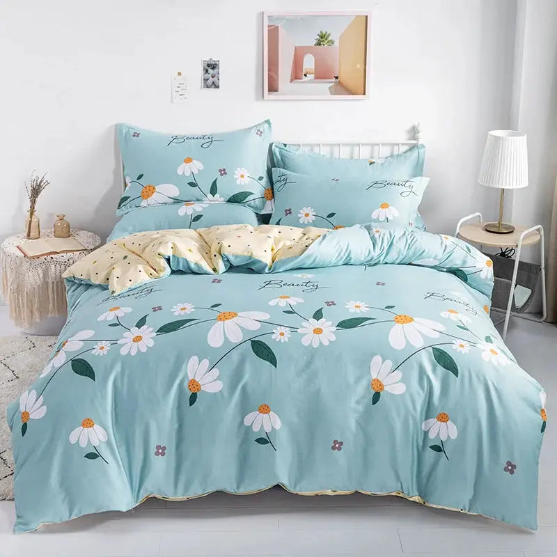 3-piece cotton duvet cover set in light blue with white daisy print; includes duvet cover and two pillowcases