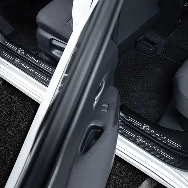Pair of Peugeot door sill protectors with leather-look finish and Peugeot branding for 206/208/207/3008/308/2008/107