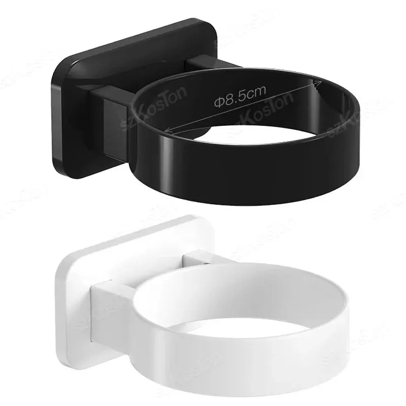 Hair dryer holder rack by Simples Market; adhesive wall-mount circular ring in black and white (2 items shown)