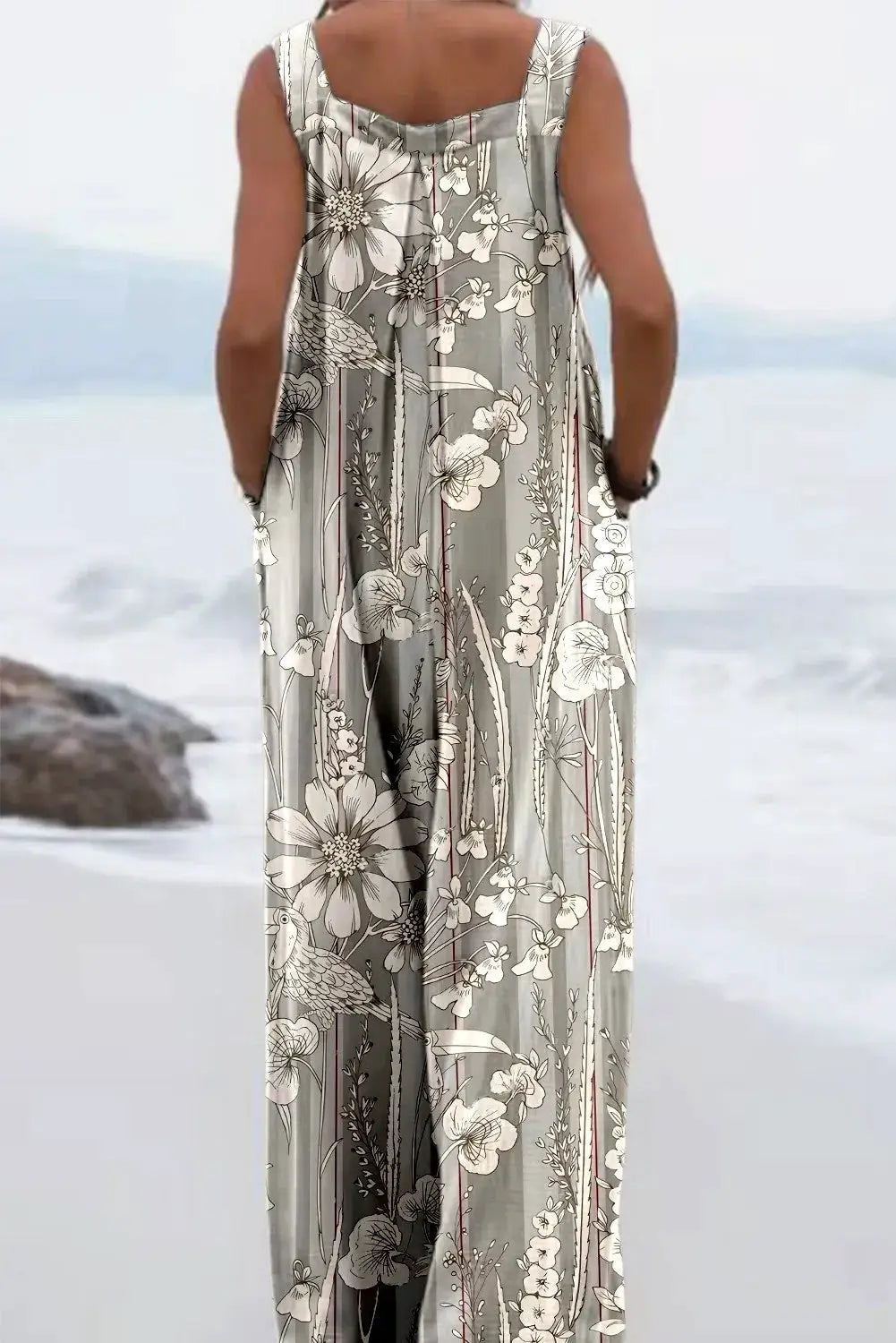 Sleeveless jumpsuit with vintage gray floral print and loose wide-leg fit by Simples Market