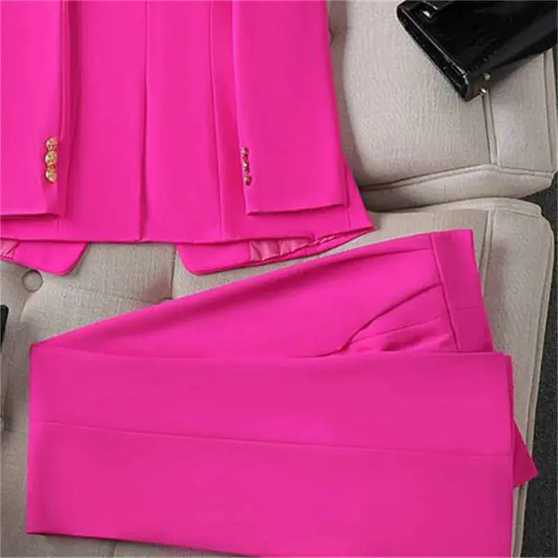 Pink two-piece women's blazer and pants suit set, office wear with gold-tone cuff buttons