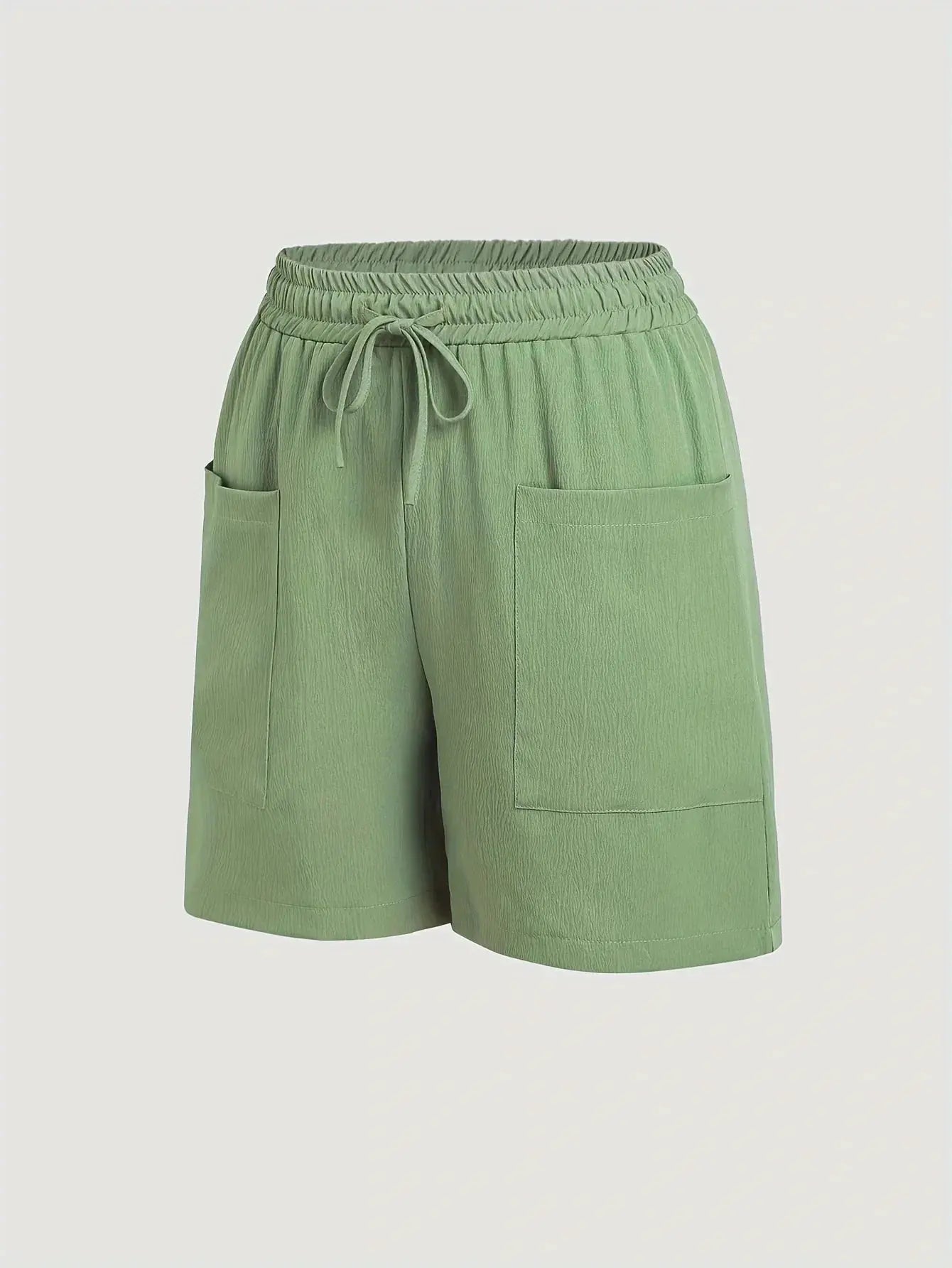 Women's green drawstring shorts with pockets by Simples Market
