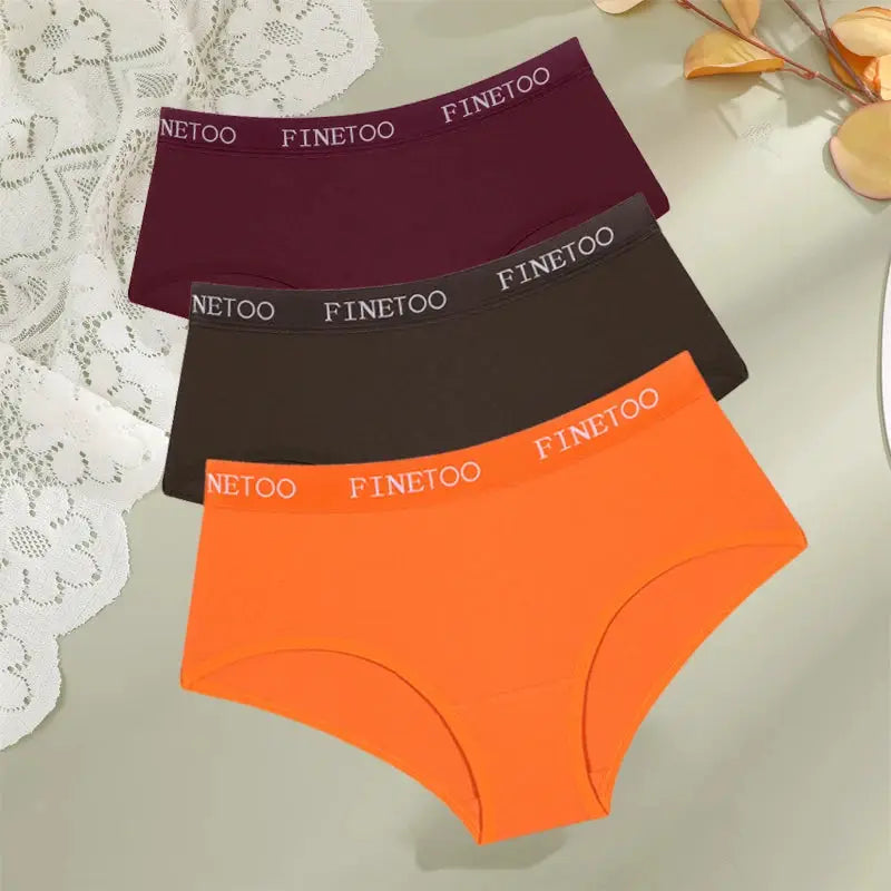 3-pack FINETOO cotton women's underwear with logo waistband in orange, brown, and burgundy.