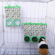 Rabbit hay bag by Simples Market; avocado-pattern hanging feeder with 2/3 holes and green trim