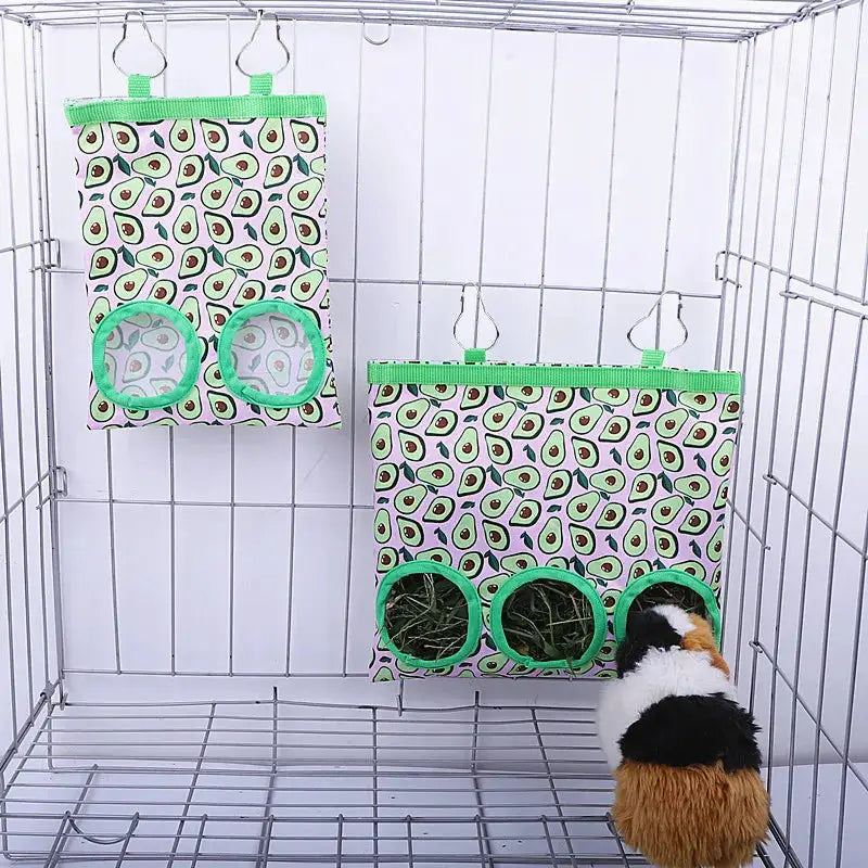 Rabbit hay bag by Simples Market; avocado-pattern hanging feeder with 2/3 holes and green trim