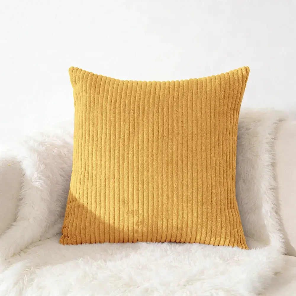Corduroy pillow cover in mustard yellow with vertical ridges, plush cushion for sofa