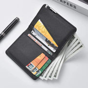 Wallet black faux leather slim business-style with multiple card slots and cash compartment.