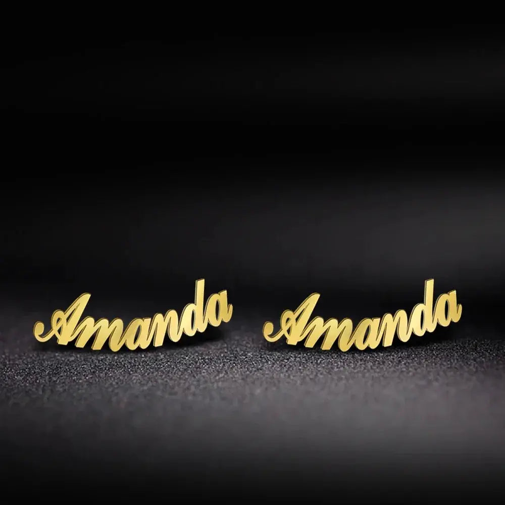 Gold-tone stainless steel custom name stud earrings spelling Amanda; set of 2