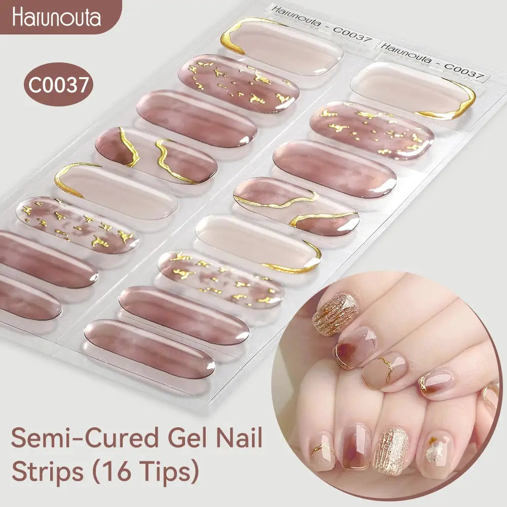 Gradient Auroras Semi-Cured Gel Nail Strips from Harunouta, 16 pink-mauve tips with gold foil accents