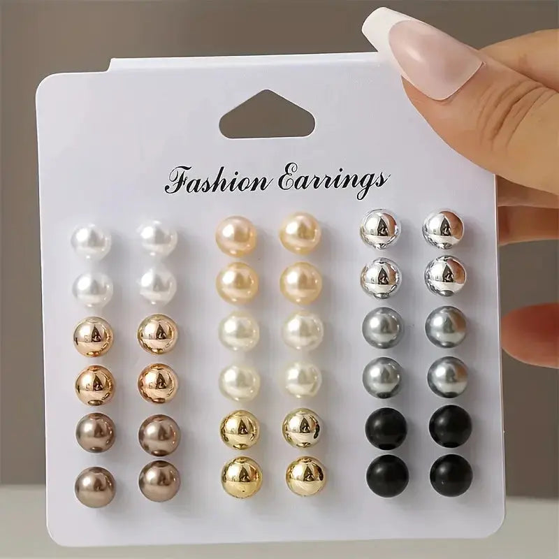 18-pair set of imitation pearl ball stud earrings in assorted colors on a white display card