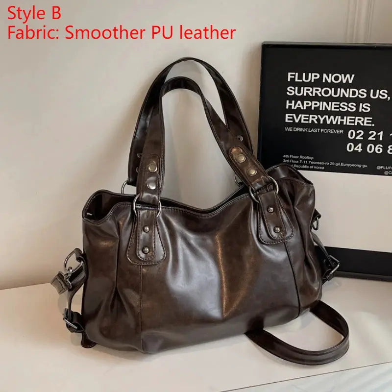 Shoulder bag in brown PU leather with dual handles and detachable crossbody strap