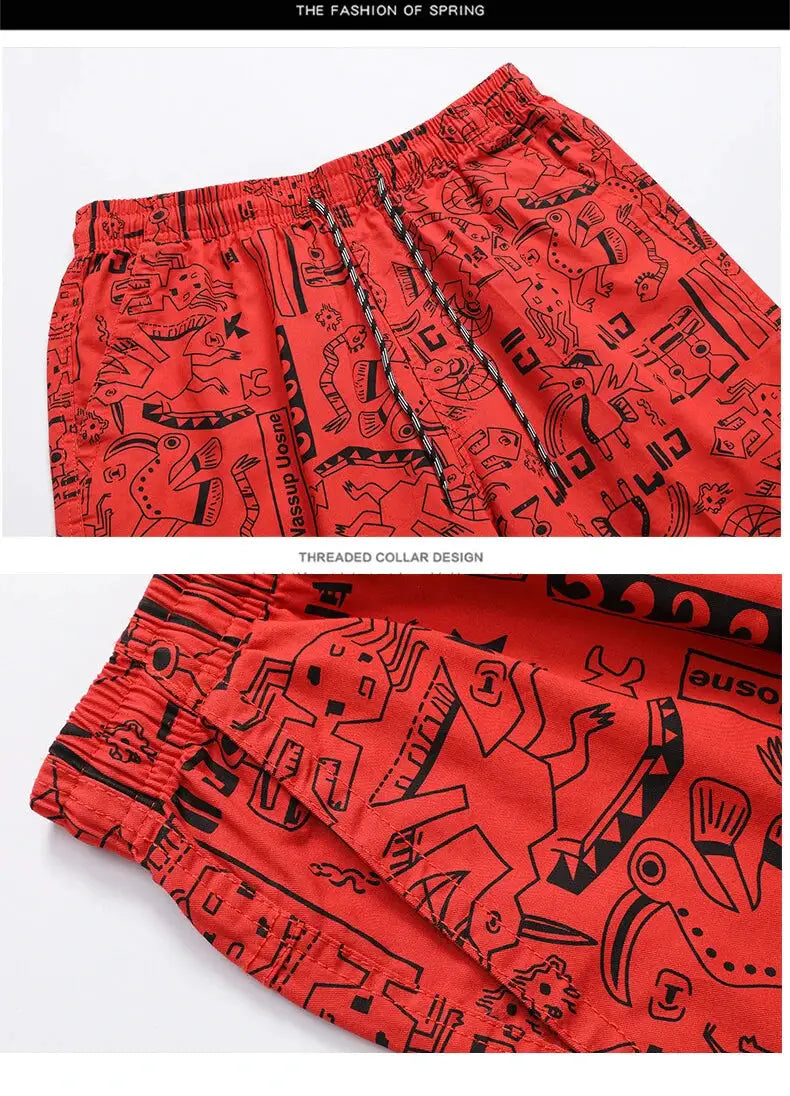 Mens 100% cotton red printed beach shorts with elastic drawstring waist, relaxed fit.