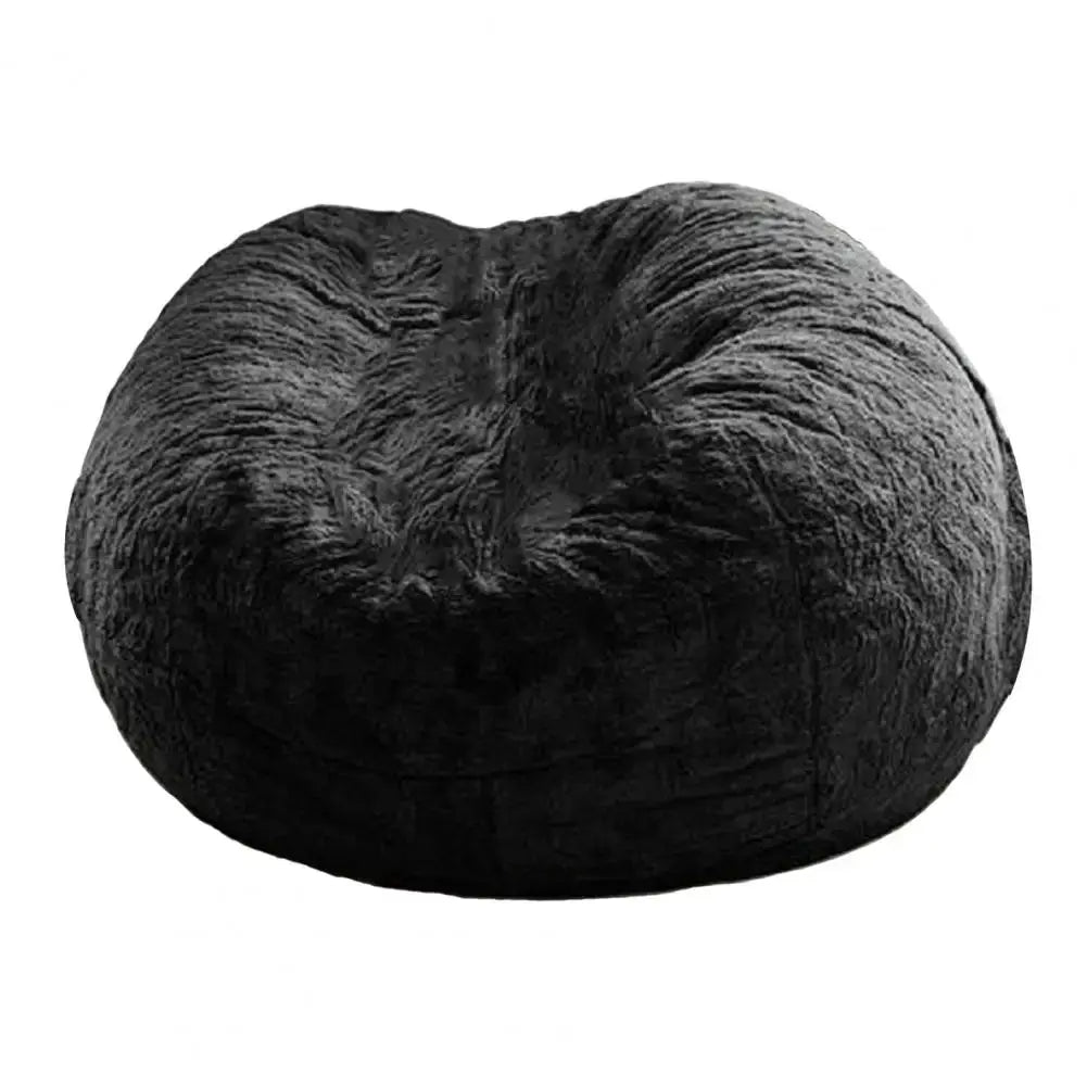 Bean bag pouf with black plush faux-fur cover; oversized floor lounge seat