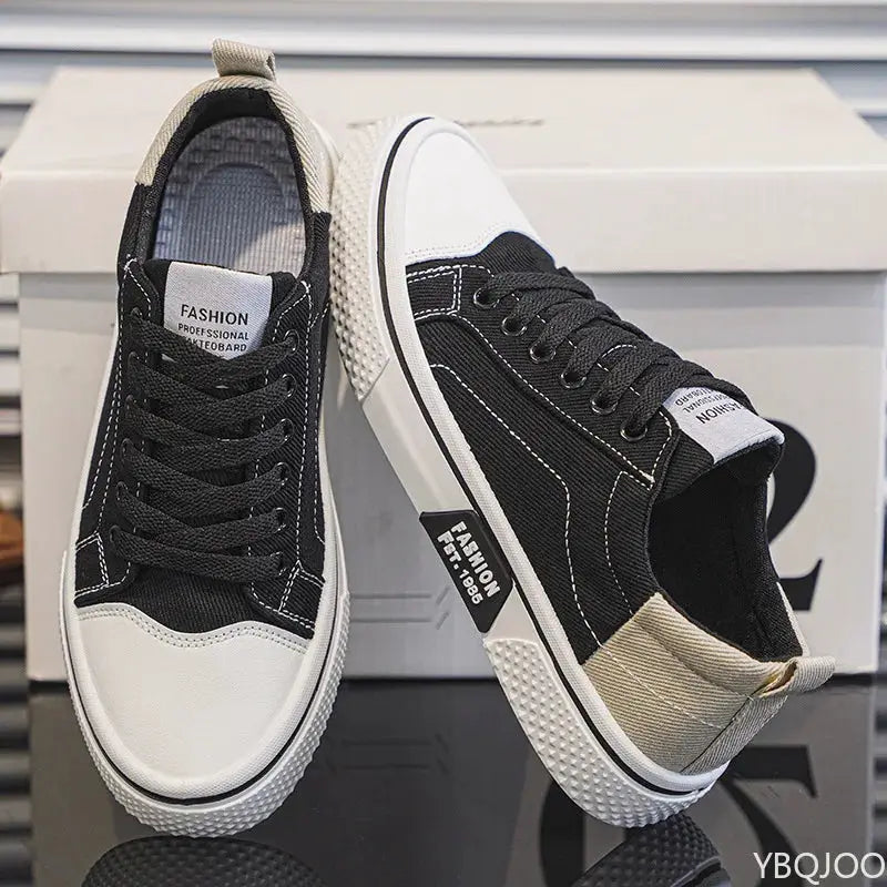 Simples Market men's canvas sneakers, pair in black with white toe cap and beige heel tab, lightweight casual footwear.