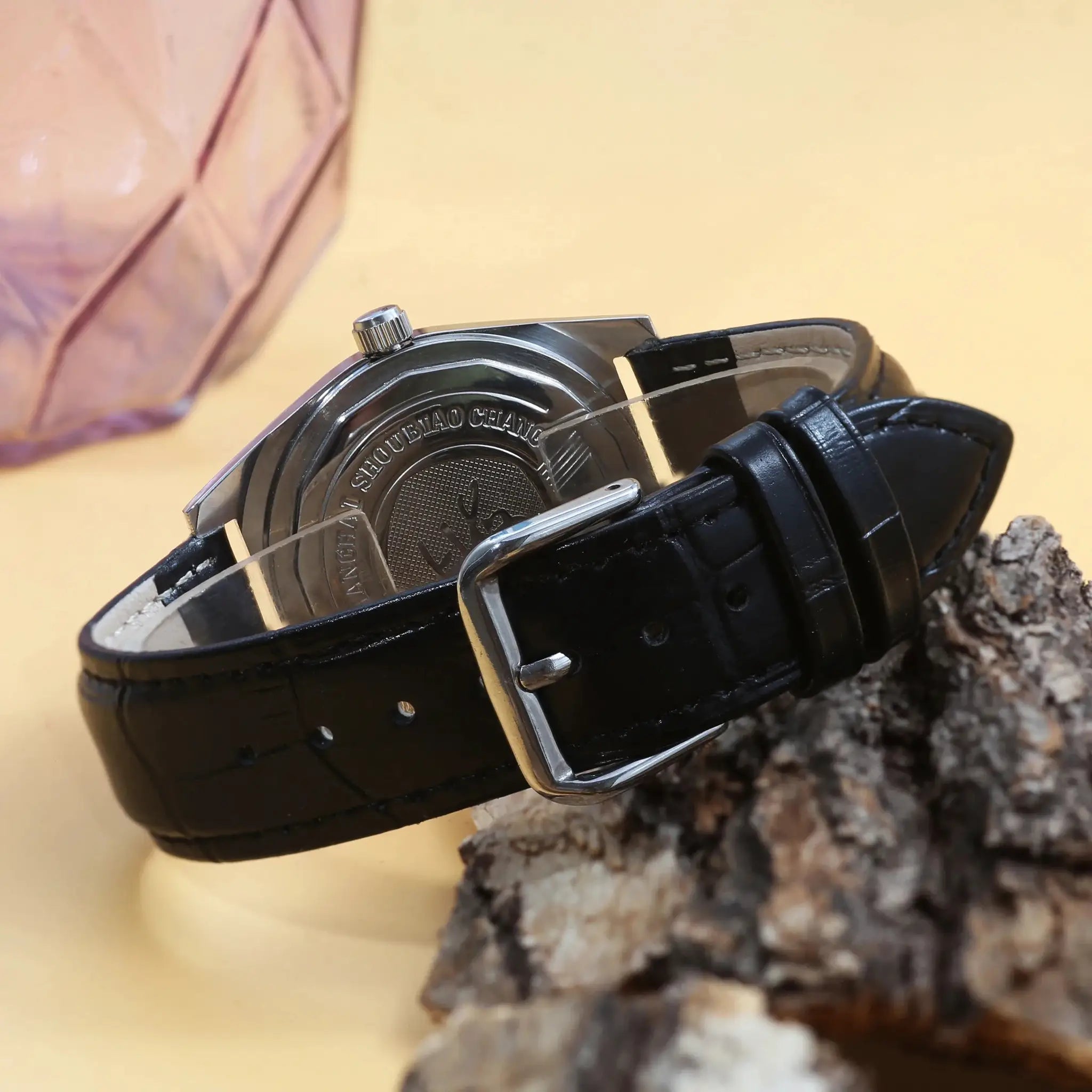 7120 hand-wind mechanical watch, 36mm, stainless steel case, black leather strap.