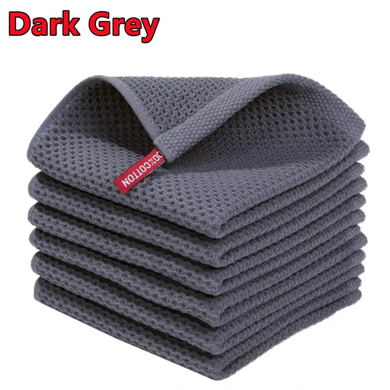 Dark grey 100% cotton dishcloth set of ultra-soft, absorbent kitchen towels, stacked.