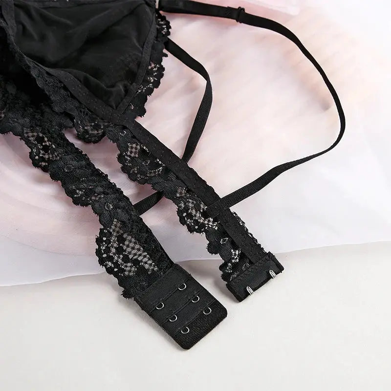 Black lace bralette with adjustable straps and back hook closures