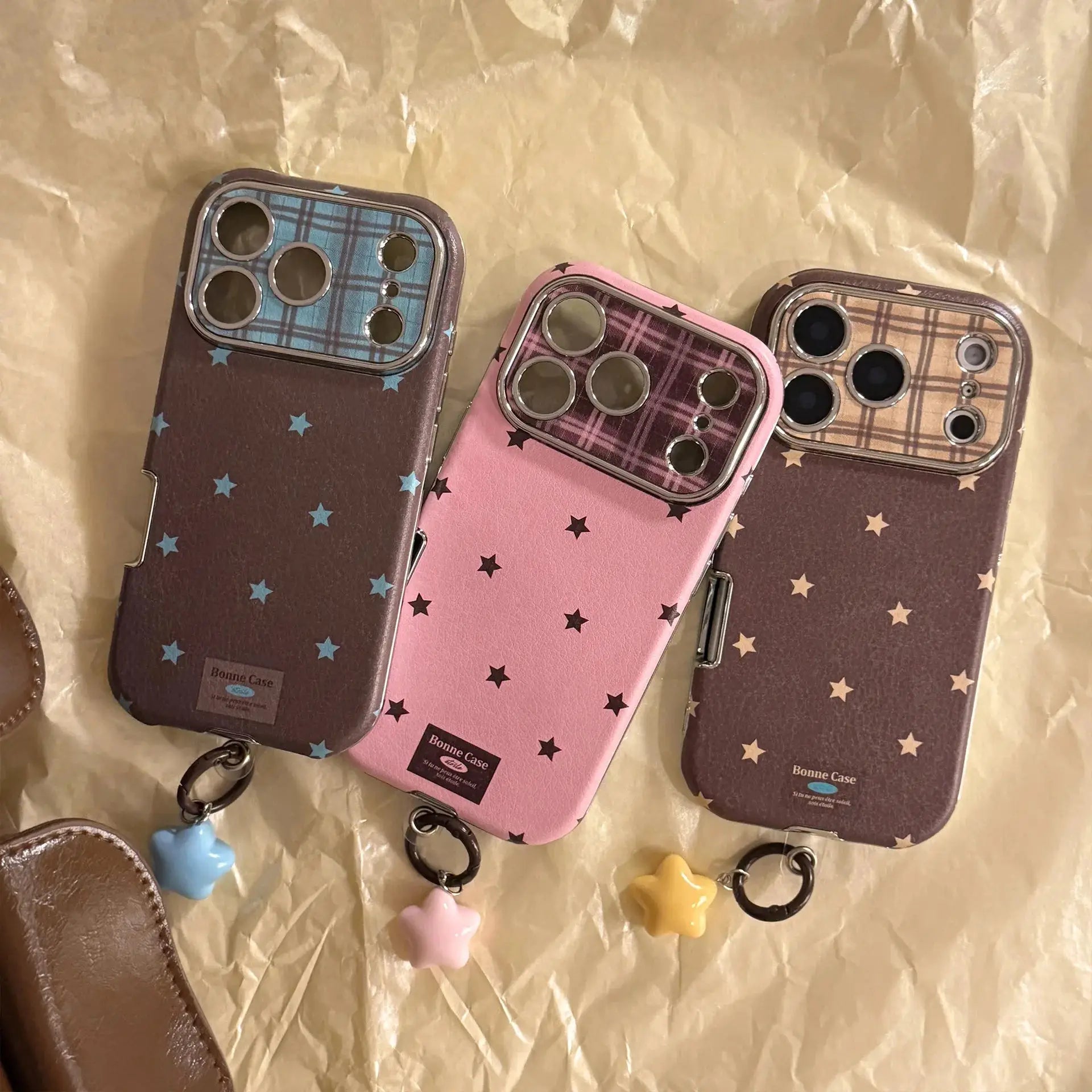 Set of three Bonne Case iPhone cases with Korean retro star plaid leather texture in blue, pink, brown