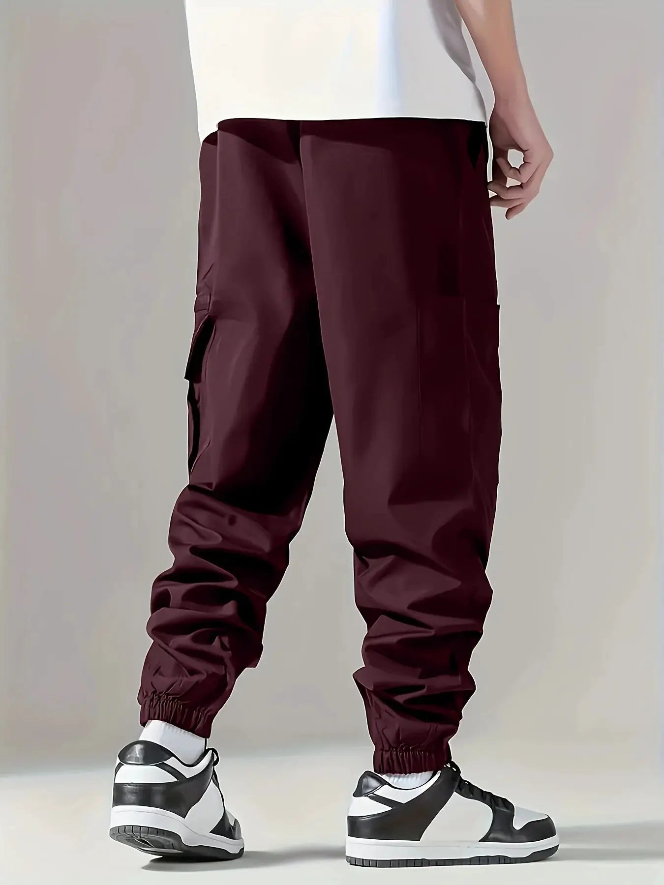 Men's cargo pants, burgundy, breathable lightweight fabric with multiple pockets and elastic cuffs