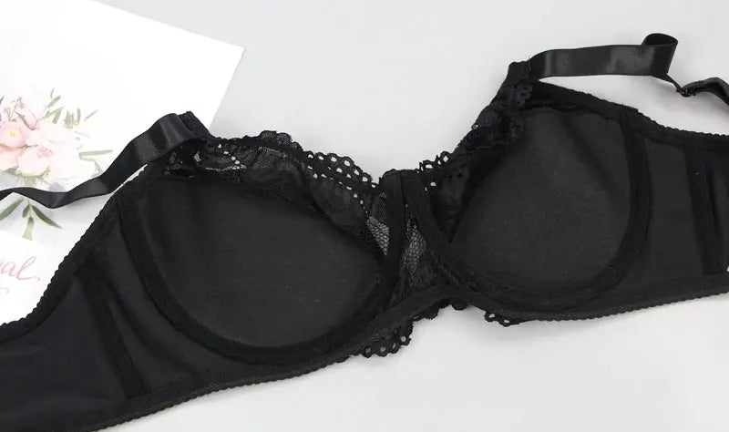 Bra with black lace underwire and adjustable straps, large size